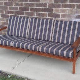 Wood-frame sofa with striped linen cushions