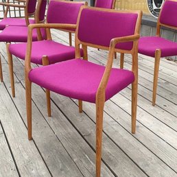 Møller-style dining chairs in magenta wool